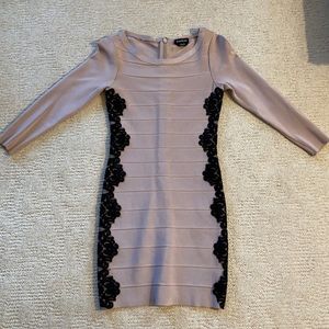 Stunning BeBe bandaid dress with lace details